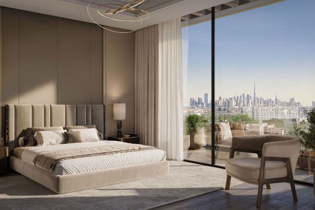 Elegant bedroom with beige decor, a large bed, and floor-to-ceiling windows offering a skyline view. Modern chandelier and potted plants included.