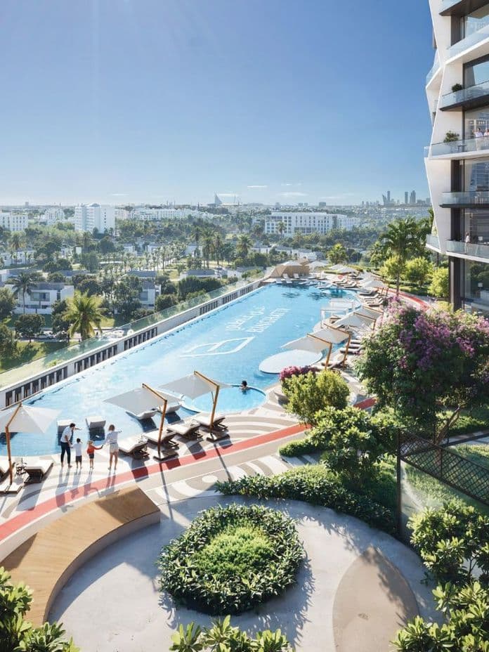 Elevated outdoor amenities at Binghatti Circle including infiity pool, lounge beds, garden paths, and recreational spaces with city views.