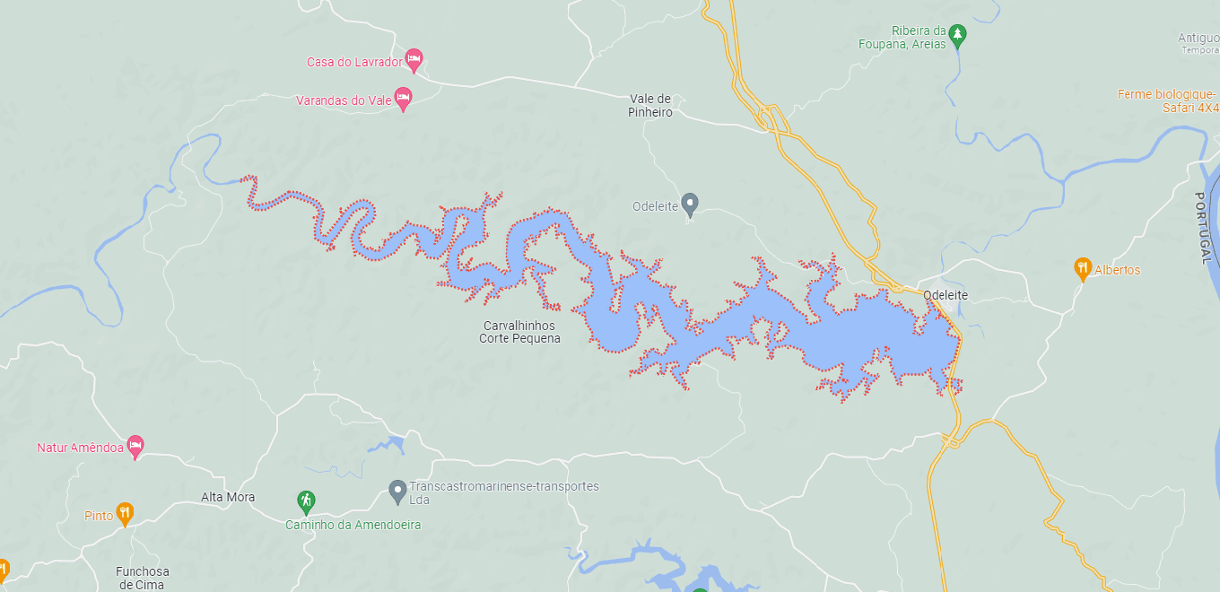 Map showing a winding river with several branches, surrounded by roads and small towns labeled with names.