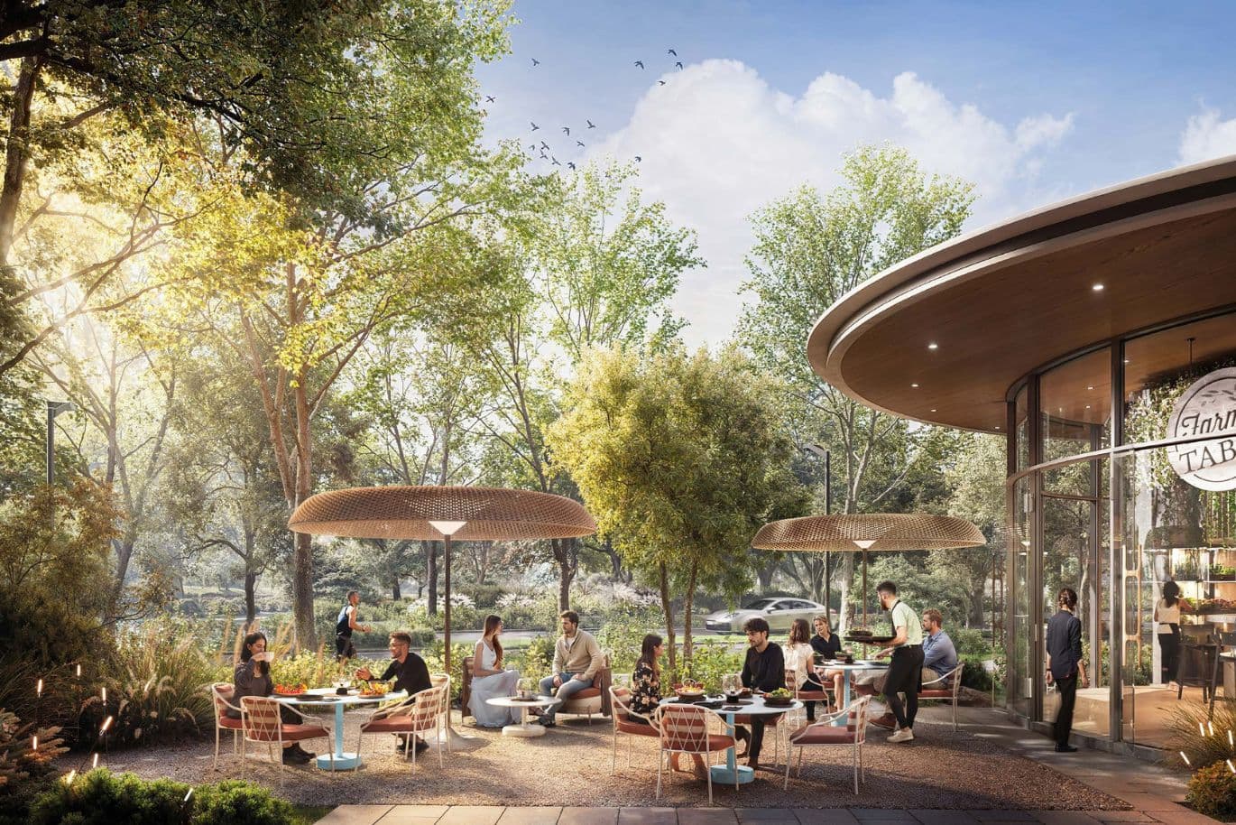 Outdoor dining amidst greenery of Ghaf Woods