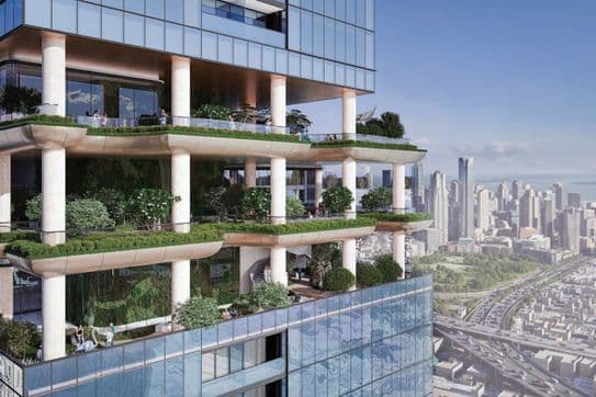 Futuristic skyscraper with lush green terraces and columns, overlooking a cityscape with highways and buildings under a clear blue sky.