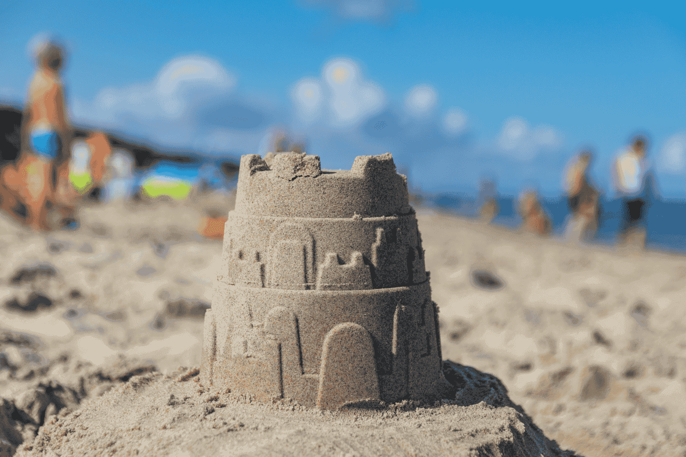 Sand Castle Tower at Beach with blue sky in the background