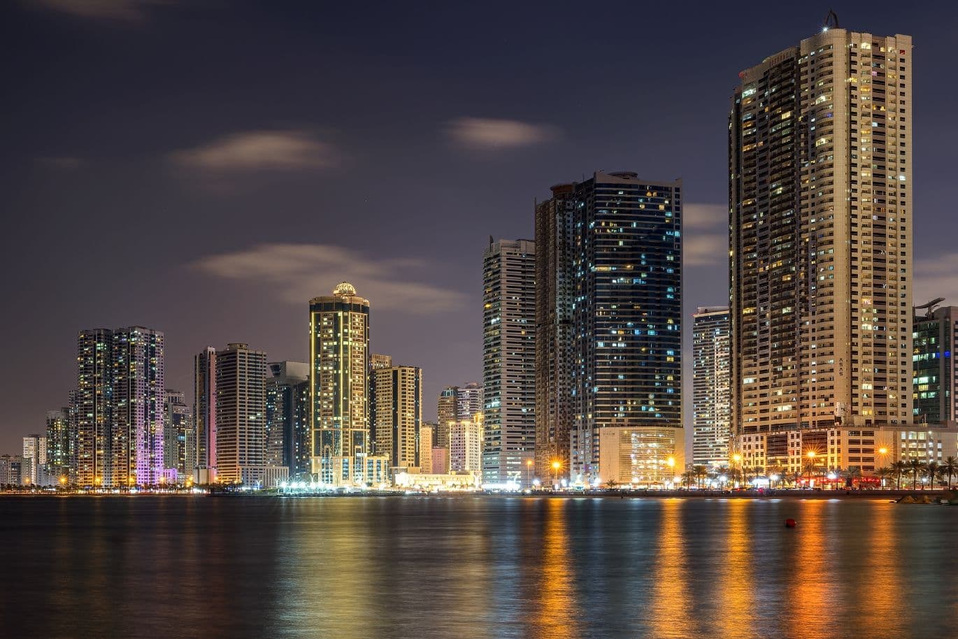 skyline of sharjah vs dubai