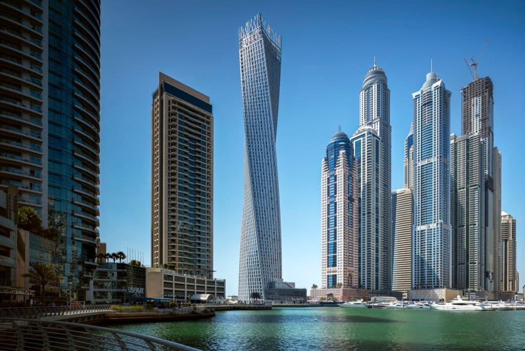 The twisting Cayan Tower in Dubai Marina, an iconic building in Dubai’s famous skyline.