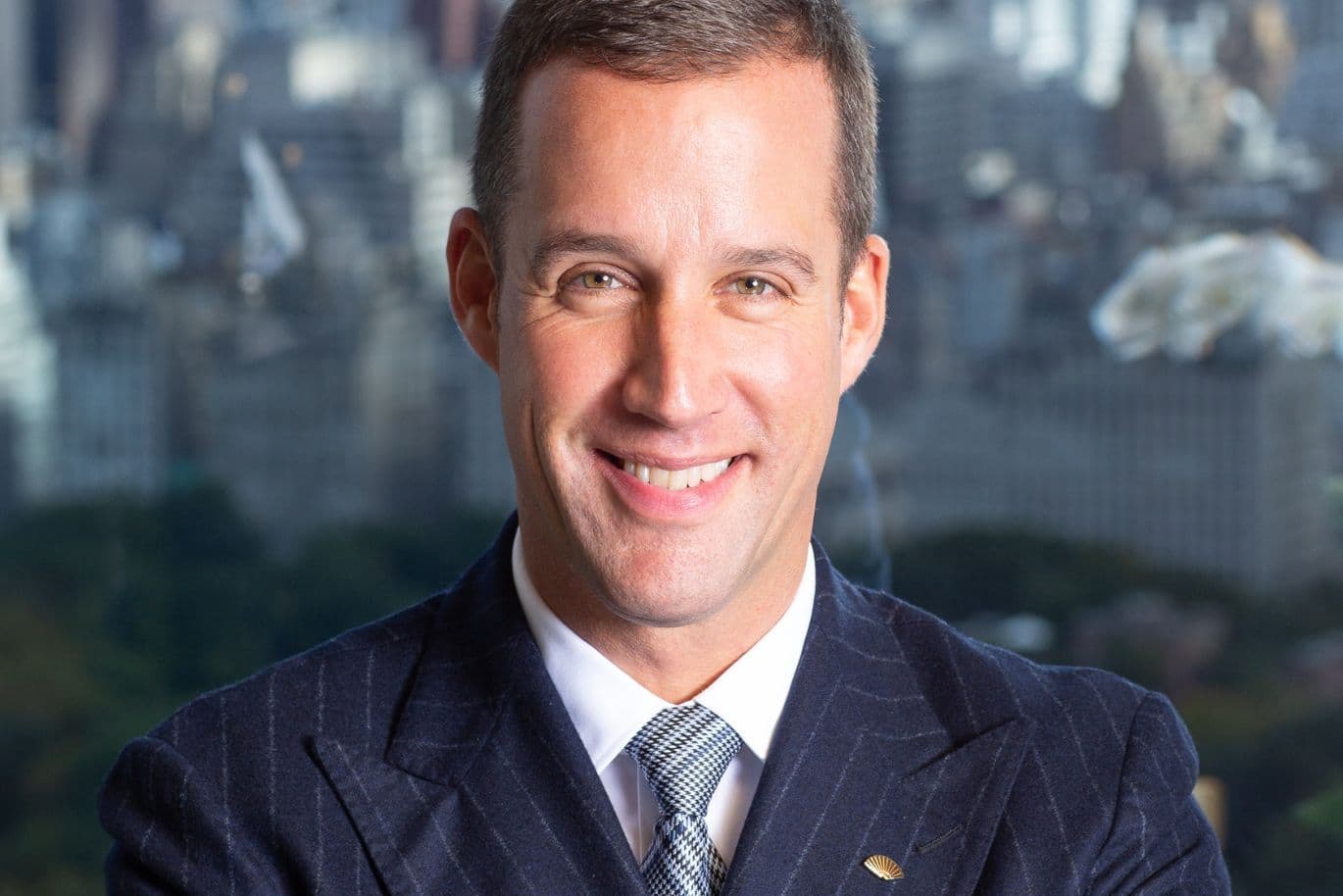 Portrait of a smiling man in a pinstriped
