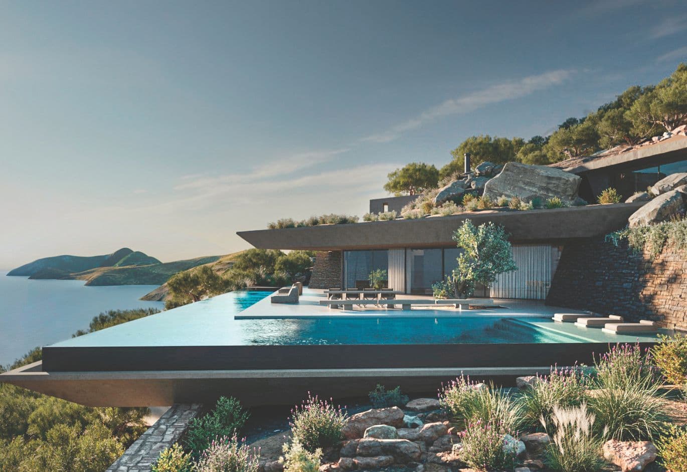 Luxury modern villa with infinity pool overlooking the sea and natural landscape