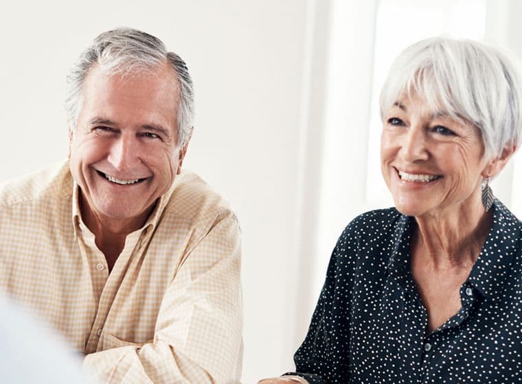 Shot of a senior couple getting advice from their financial consultant at home