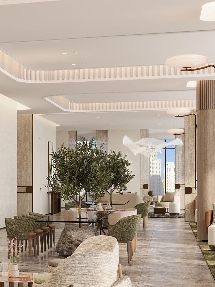 Sophisticated lobby lounge in Marriott Residences JLT featuring modern furniture, indoor plants, and ambient lighting with skyline views.