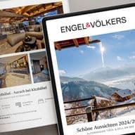 Stilvolle Flatlay-Aufnahme mit Immobilienkatalog, Tablet mit Engel & Völkers Cover und einer Tasse Kaffee zur Promotion des "Schöne Aussichten 2024/2025" Katalogs.
