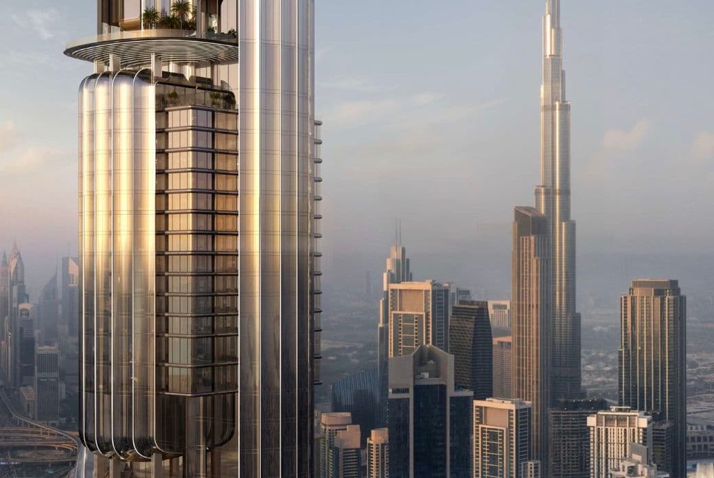 Futuristic skyscraper with a curved design and rooftop gardens, set against a city skyline with a taller iconic tower in the background at sunset.