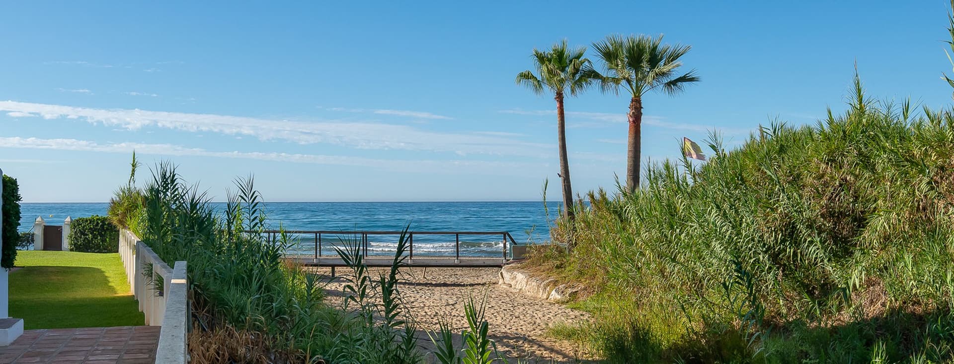 El Rosario sea views from a beachfront property, there are green plants next to the views.