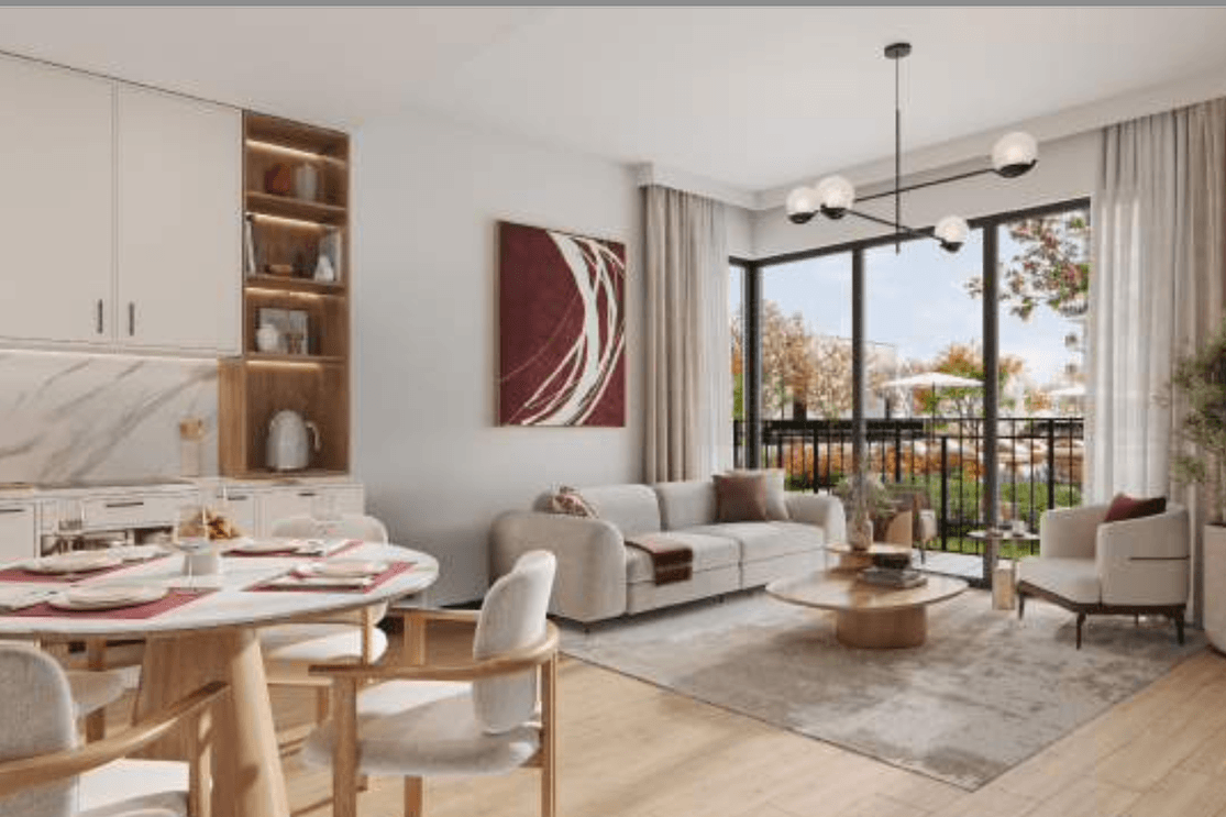 A contemporary living space with an open plan layout, large windows, and neutral interiors that bring in natural light and create a comfortable setting for daily use.