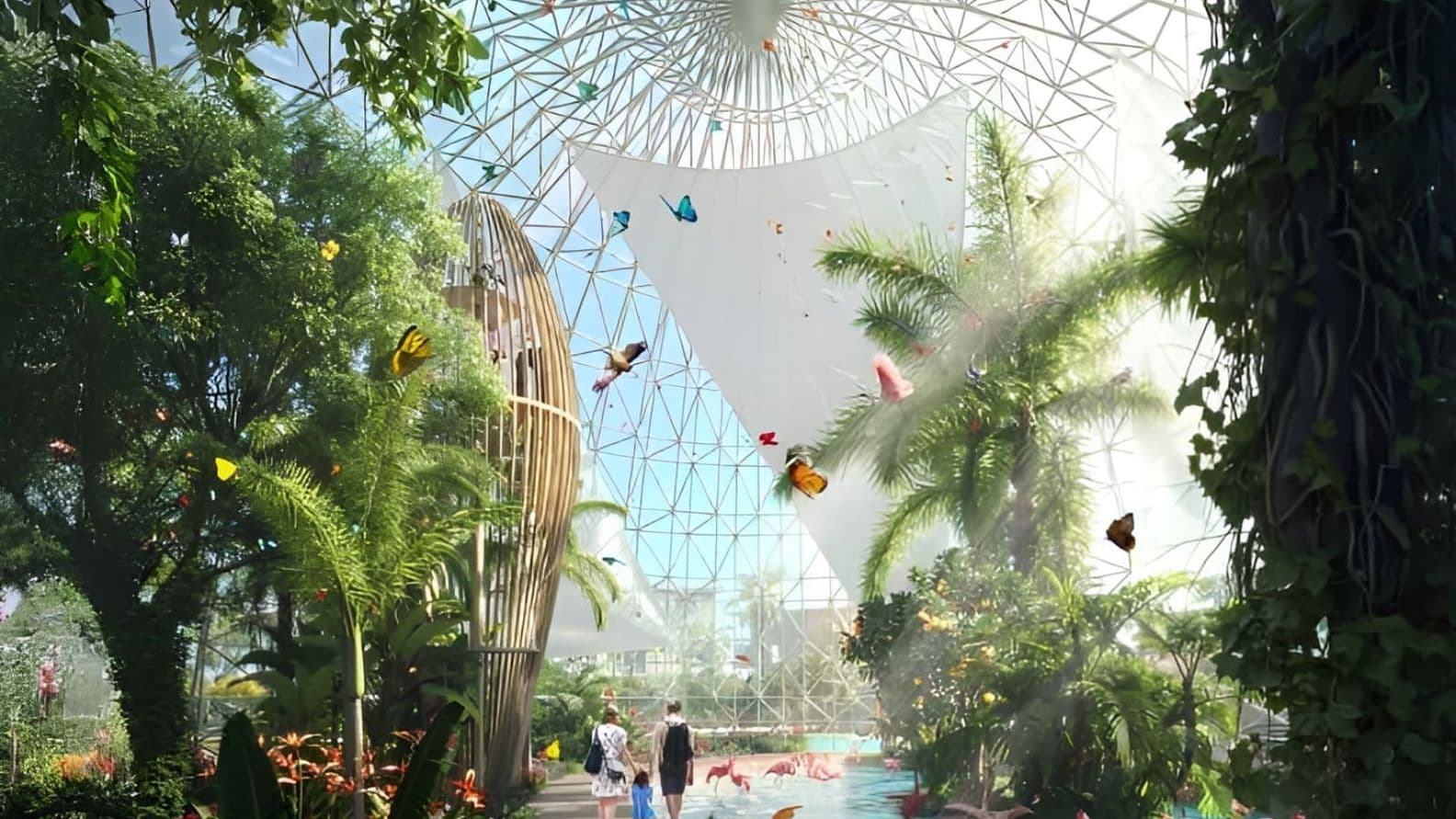 A tropical indoor garden with palm trees, plants, butterflies, and a glass dome structure where visitors walk along a water edge pathway.