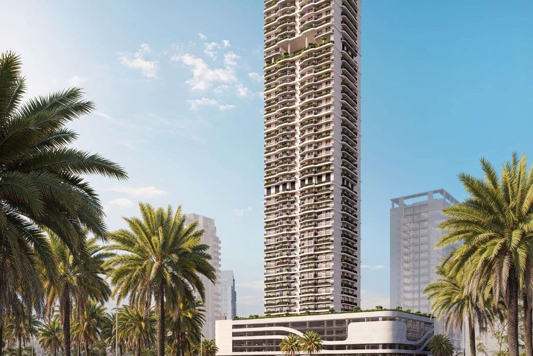 Street-level view of the full ALTA V1EW tower with palm-lined roads, sleek modern podium, and high-rise architecture set against surrounding towers and a clear blue sky.