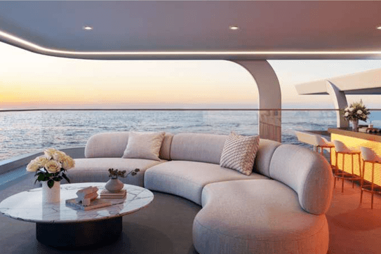Sky lounge at ELLE Residences with seating areas and elevated views from the rooftop.