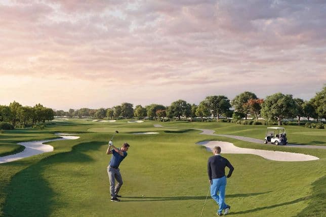 Two people on a lush golf course; one swings a club, while the other watches. A golf cart is parked nearby under a pink-hued sky.