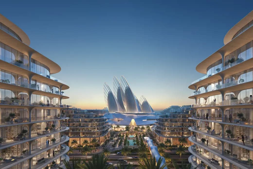 Futuristic architecture and high-rise buildings with glass facades at sunset, featuring a sculptural landmark in the background.