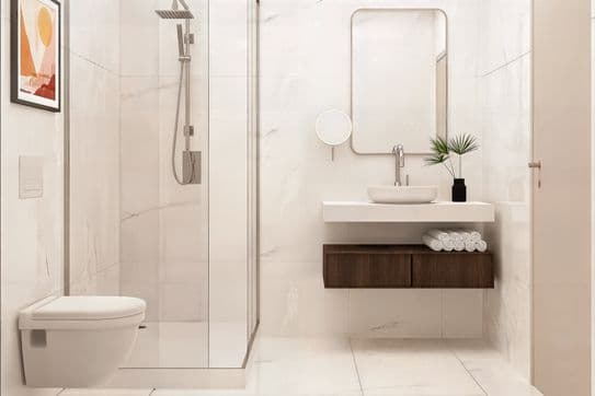 Modern bathroom with a glass shower, wall-mounted toilet, floating vanity with a round basin, mirror, towel stack, and potted plant.