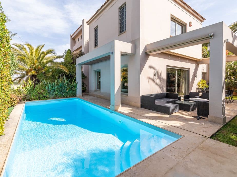 A modern maisonette in Neo Psychiko with luxury swimming pool during the day