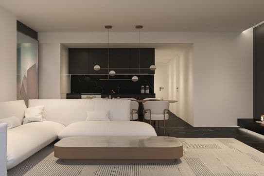 Minimal modern open-plan living area with white sectional sofa, low coffee table, black marble kitchen, pendant lights and recessed fireplace.
