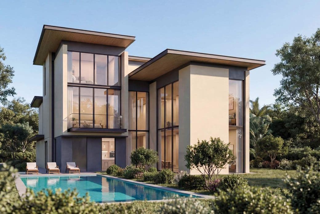 Modern two-story house with large windows, surrounded by trees, featuring a pool and sun loungers in the foreground.