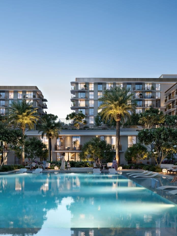 Panoramic view of Sera 2 at Rashid Yachts & Marina, showcasing twin residential towers with landscaped gardens, pools, and leisure decks.