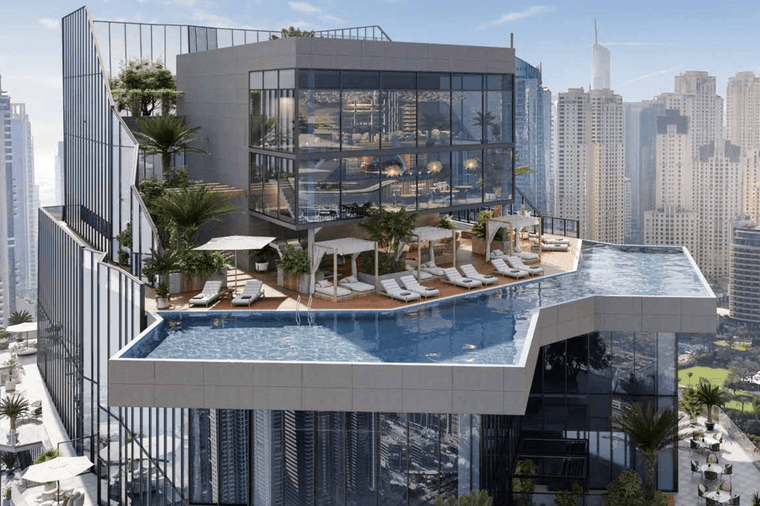 Rooftop with modern glass building, pool, lounge chairs, and greenery, overlooking a cityscape with tall skyscrapers in the background.