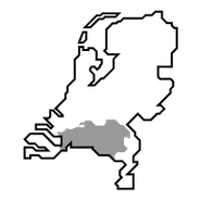 Gray silhouette of a landmass against a black background. The shape is irregular and abstract.