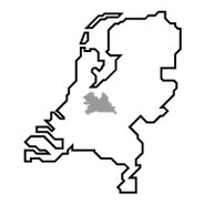 Gray landmass shape centered on a black background, possibly a map outline.