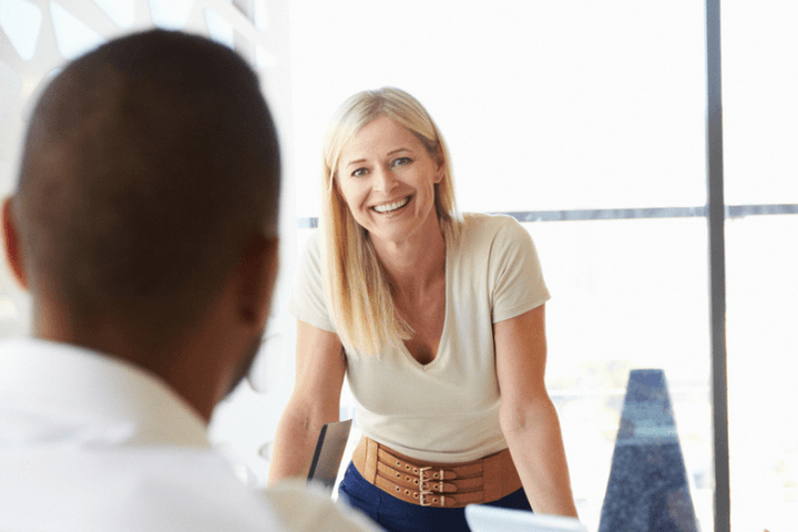 Group of people chatting in a meeting room