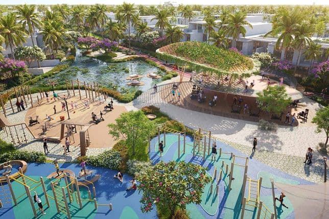 Aerial view of a vibrant park with playgrounds, exercise equipment, palm trees, a pond with pedal boats, and people enjoying various activities.