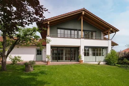 Exterior view of a modernised country house in Berg-Aufkirchen