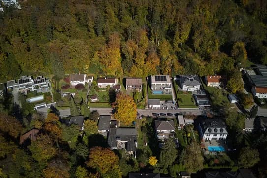 Aerial view of a plot of land on the edge of a woodland in Starnberg
