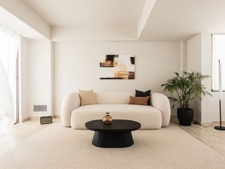 A minimal living room with white furniture in Kolonaki, Athens