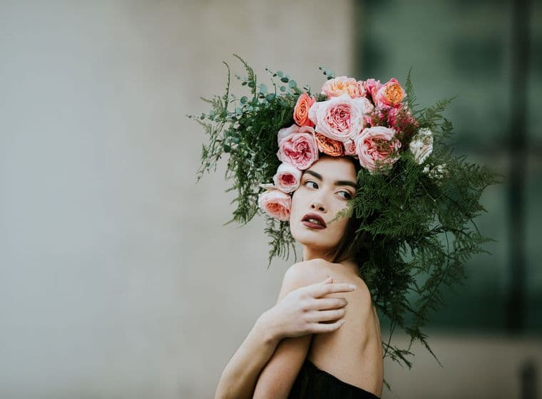 Model wearing a floral crown made by Julia Rose.