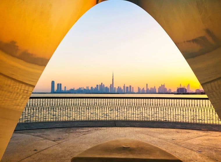Archway at Dubai Creek Harbour framing downtown skyline