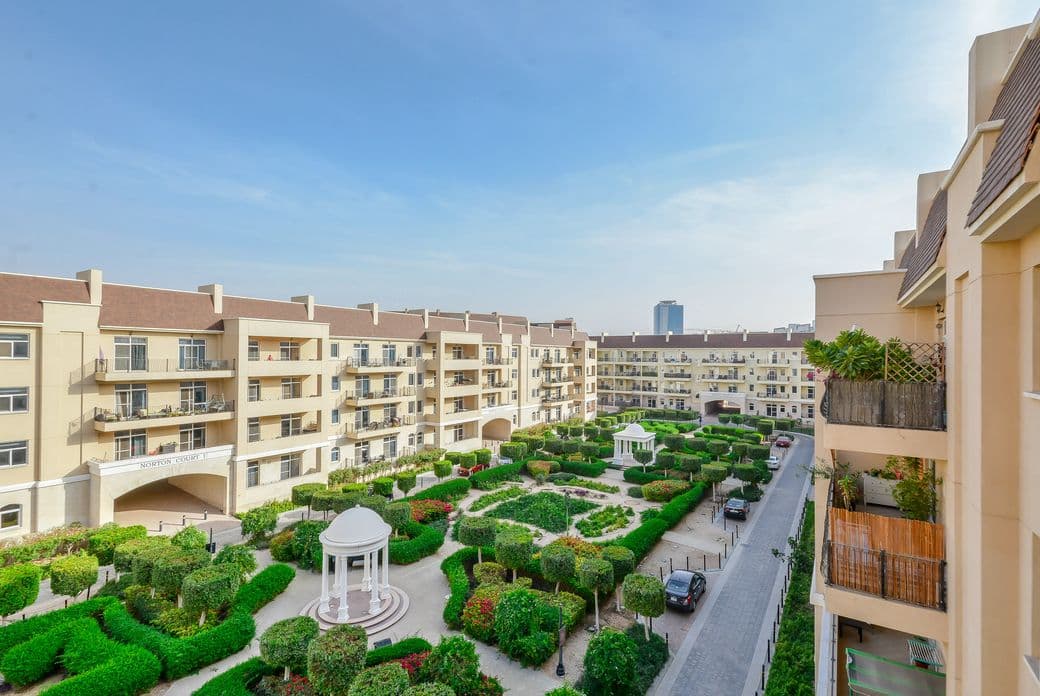 Motor City apartment buildings and park courtyard