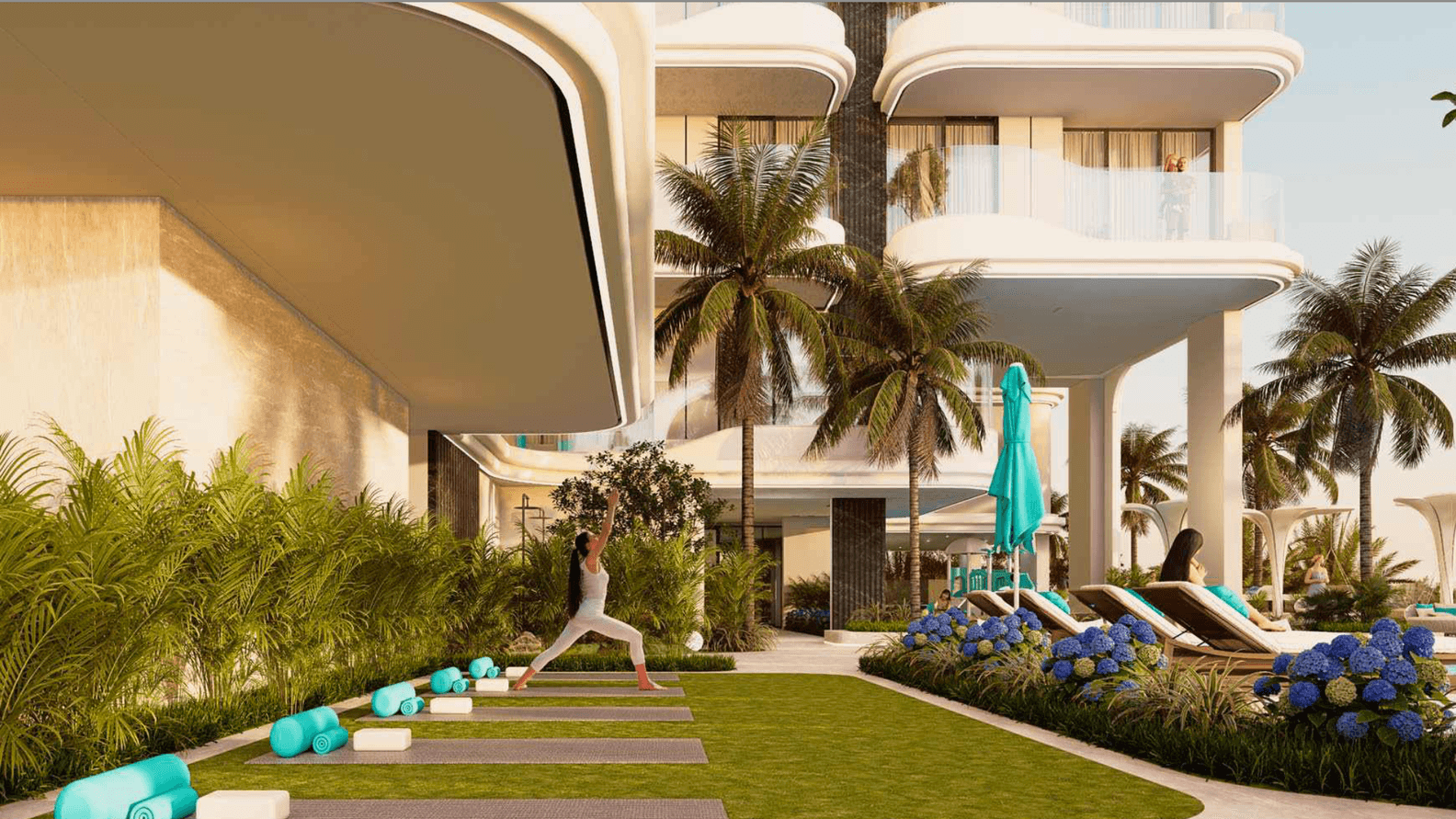 Outdoor yoga area at REEF 997 with a landscaped setting, open space for movement, and a calm environment designed for stretching and wellness activities