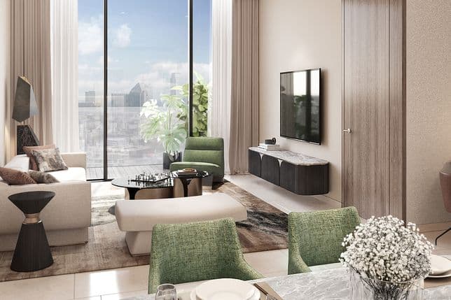 Sophisticated lobby lounge in Marriott Residences JLT featuring modern furniture, indoor plants, and ambient lighting with skyline views.