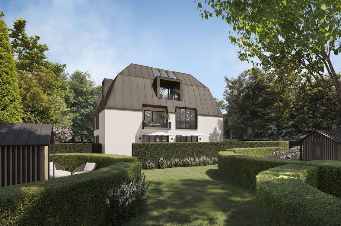 Neubau Ein- Zweifamilienhaus mit 5 großen Fenstern zum Garten, die Terrasse wird von englischen geschnittenen Hecken verdeckt