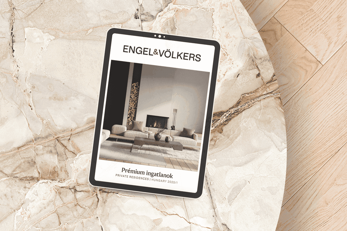 Tablet showing the Private Residences Magazine of Hungary on a stone table.