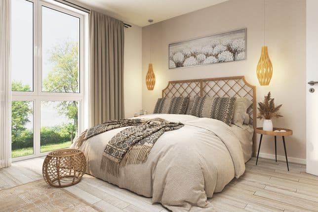 Bright and airy during the day thanks to large windows, wonderfully cozy in the evening: the bedroom invites you to relax and unwind.