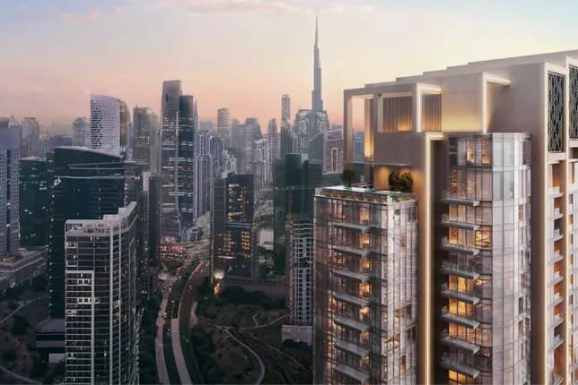 Sunset over a futuristic cityscape of glass skyscrapers; a modern residential tower with balconies on the right dominates the foreground.