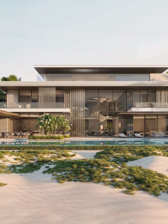 Modern beachfront villa with large glass windows, surrounded by palm trees, featuring an outdoor pool and sandy landscape in the foreground.