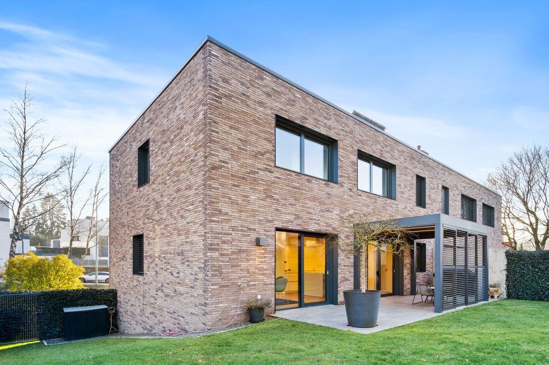 New house in Bridel with garden