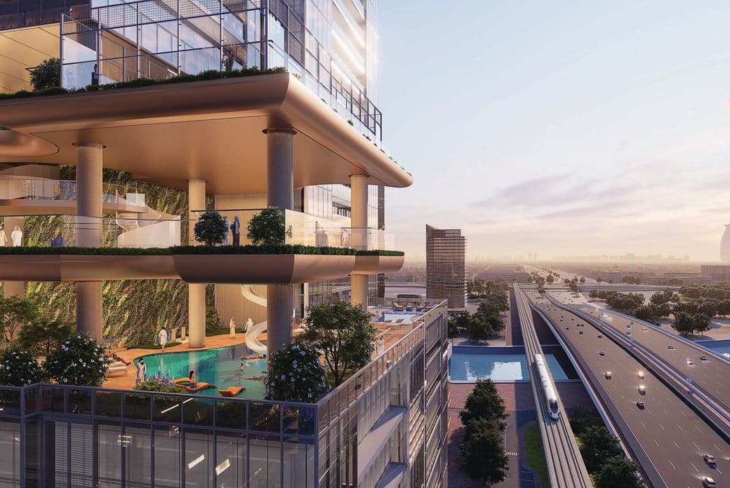 Modern multi-level building with greenery, pool, and glass facade overlooking a highway at sunset, with a cityscape in the background.