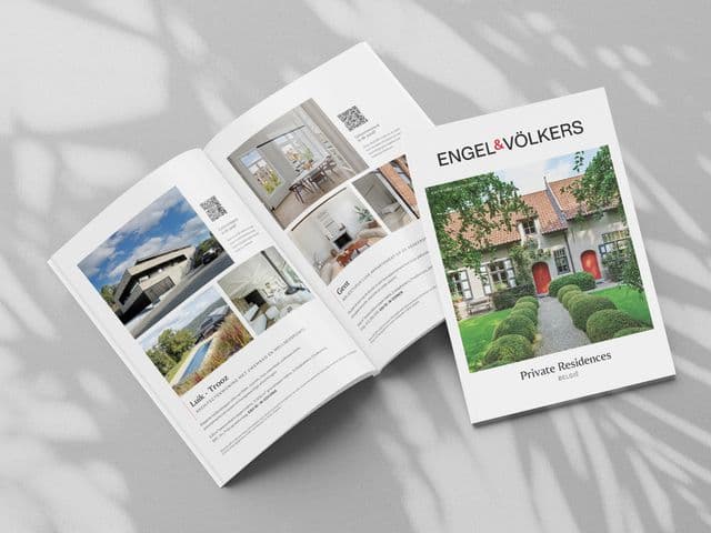Open real estate brochure with property images and descriptions, featuring a cover photo of a charming house and "Private Residences" text.