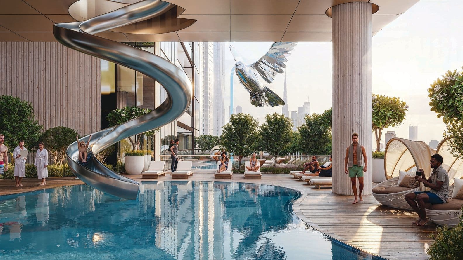 People relax by a modern pool with a slide and futuristic bird sculpture, surrounded by greenery and city skyline in the background.