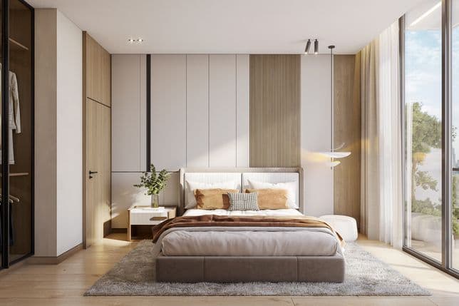 Modern bedroom with a large bed, floor-to-ceiling windows, a walk-in closet, and city view. Light wood tones and soft lighting create a cozy feel.