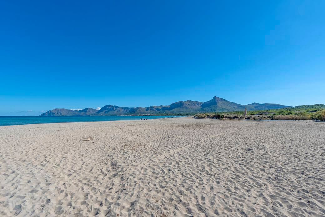 Son Serra de Marina, known for its natural beauty and stunning beach, featuring unspoiled coastline, clear waters, and a peaceful, untouched landscape